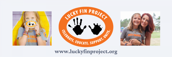 Image: The Lucky Fin Project and members of the lucky fin project. Text: www.luckyfinproject.org