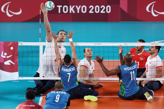Team Iran's Morteza Mehrzadselakjani playing Sitting Volleyball at Tokyo 2020