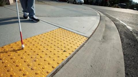 tactile paving example for the united states.  Yellow raised dots